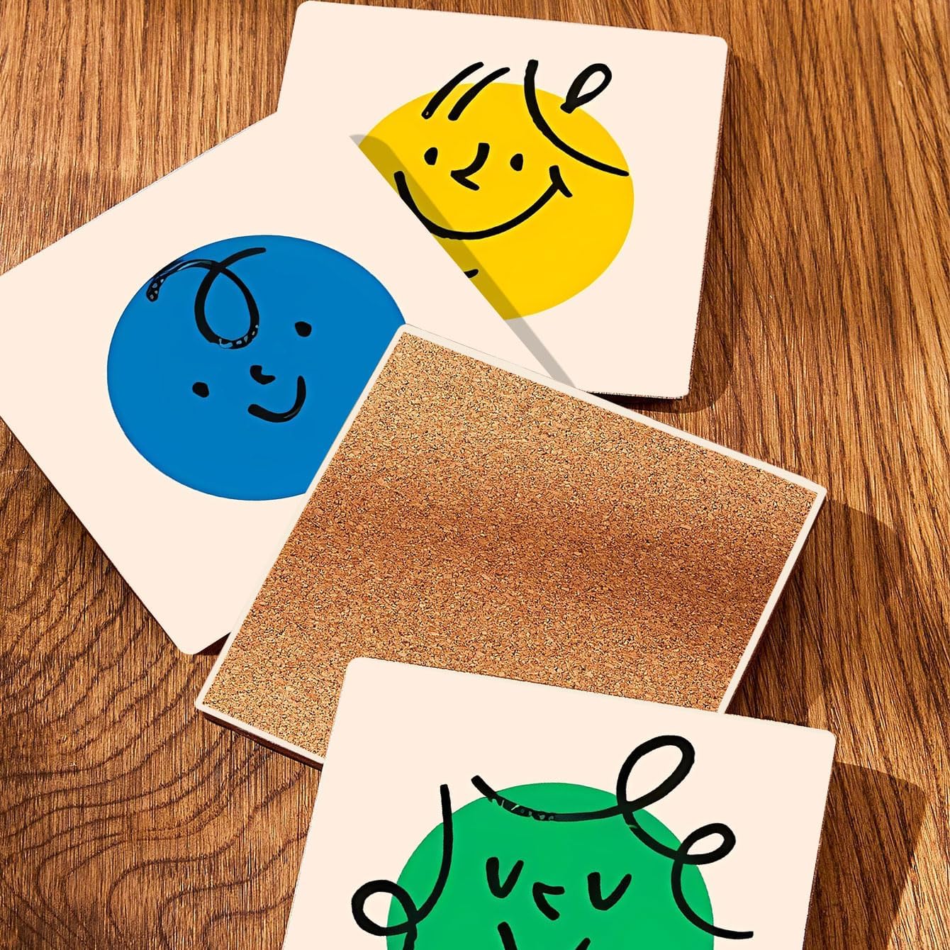 MAYCARI Cartoon Colorful Face Coasters Set of 6 Cork Backed Cute Coasters with Metal Holder Original Ceramic Surface Drink Cup Mats for Tabletop Protection Modern Desk Decoration Birthday Gifts