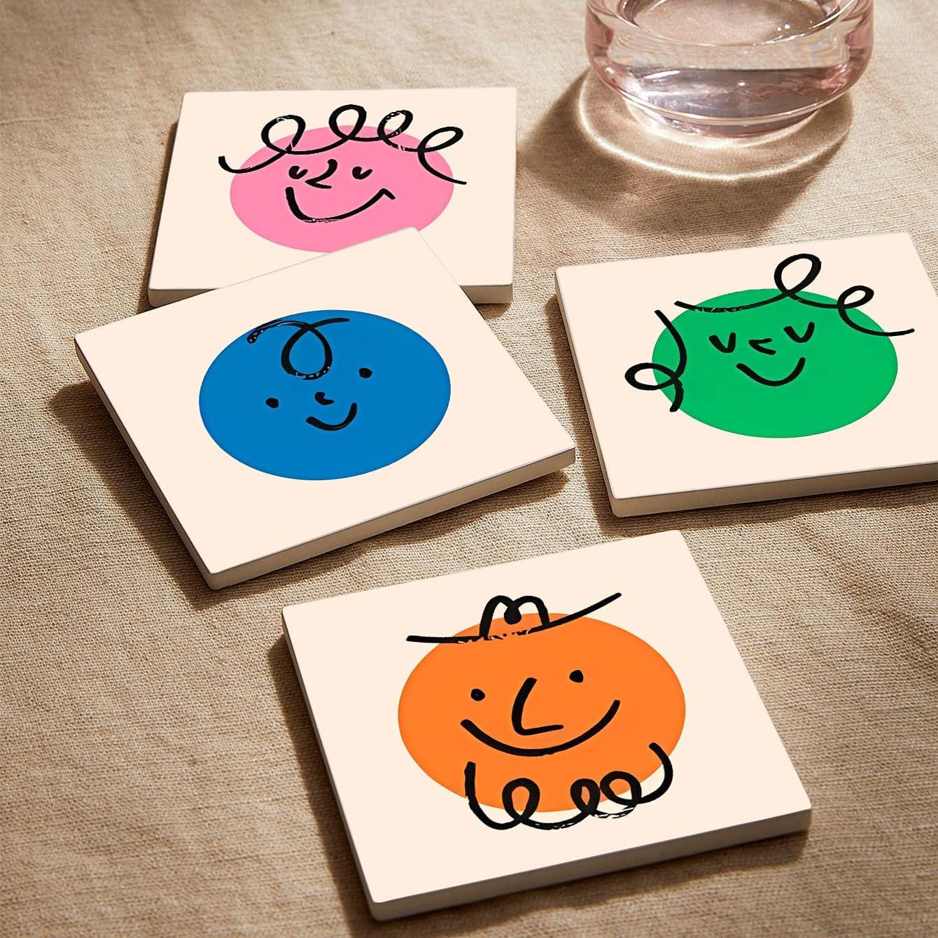 MAYCARI Cartoon Colorful Face Coasters Set of 6 Cork Backed Cute Coasters with Metal Holder Original Ceramic Surface Drink Cup Mats for Tabletop Protection Modern Desk Decoration Birthday Gifts